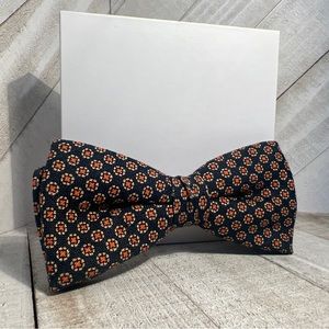 Vintage Royal Rust clip on Bowtie. Blue With Orange Spots.